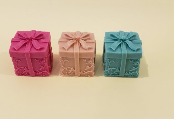 3 little soaps that look like gift boxes