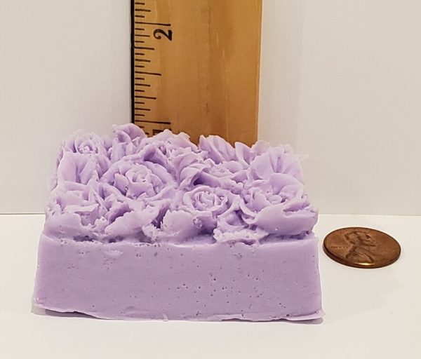 rose top soap with ruler to show height