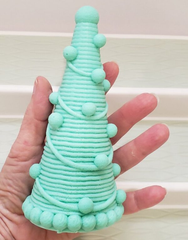 tall-Christmas-tree-soap-in-hand-to-show-scale