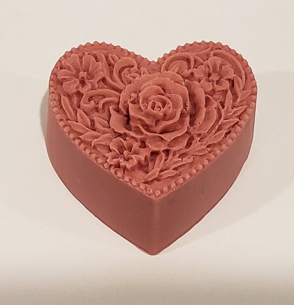 rose colored heart shaped soap