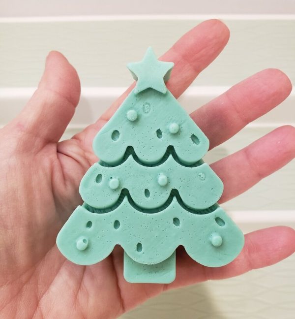 Little-Christmas-tree-soap-in-hand-to-show-scale
